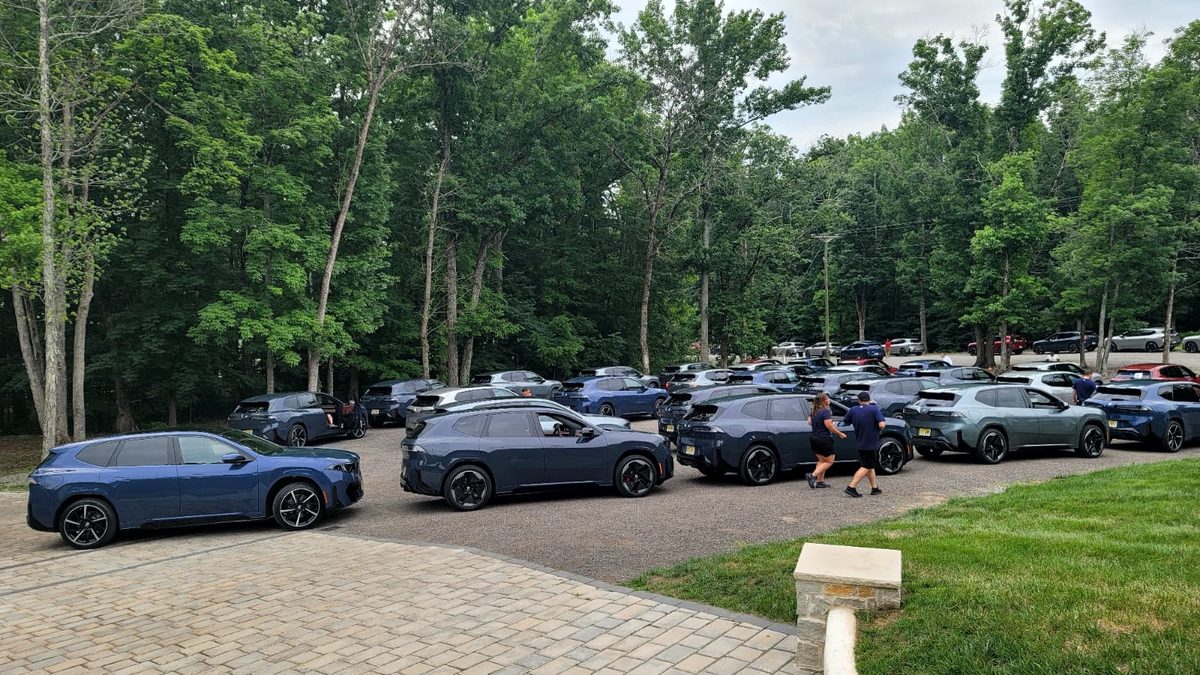 A sea of 250+ BMW iX3 electric SUVs at Saddlewood Farm during BMW's Nashville iX3 Master Class